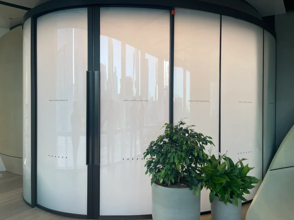 Switchable smart glass used for a modern retail product showcase with privacy control.