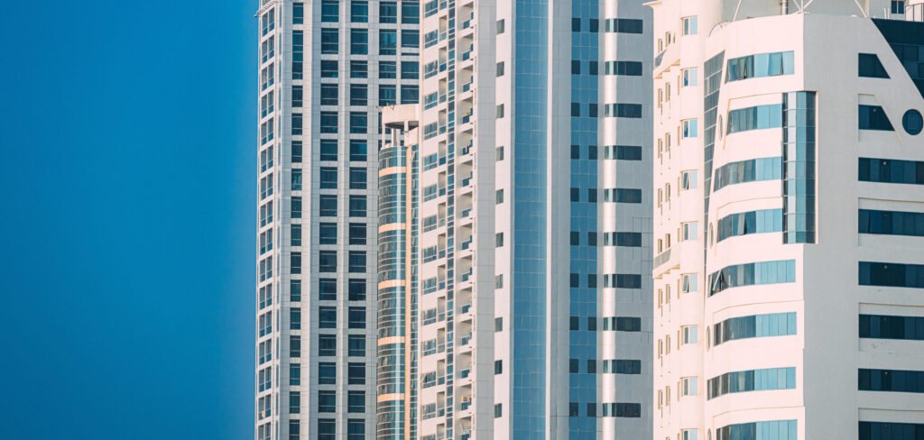Modern commercial buildings featuring aluminum cladding in Dubai for durable and energy-efficient exterior architecture.